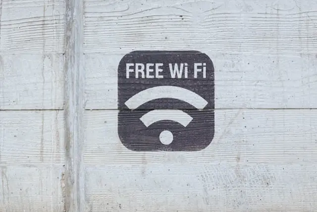 Free Wifi painted on wood