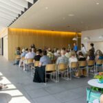 Speaker and audience in Level Four Reception Area